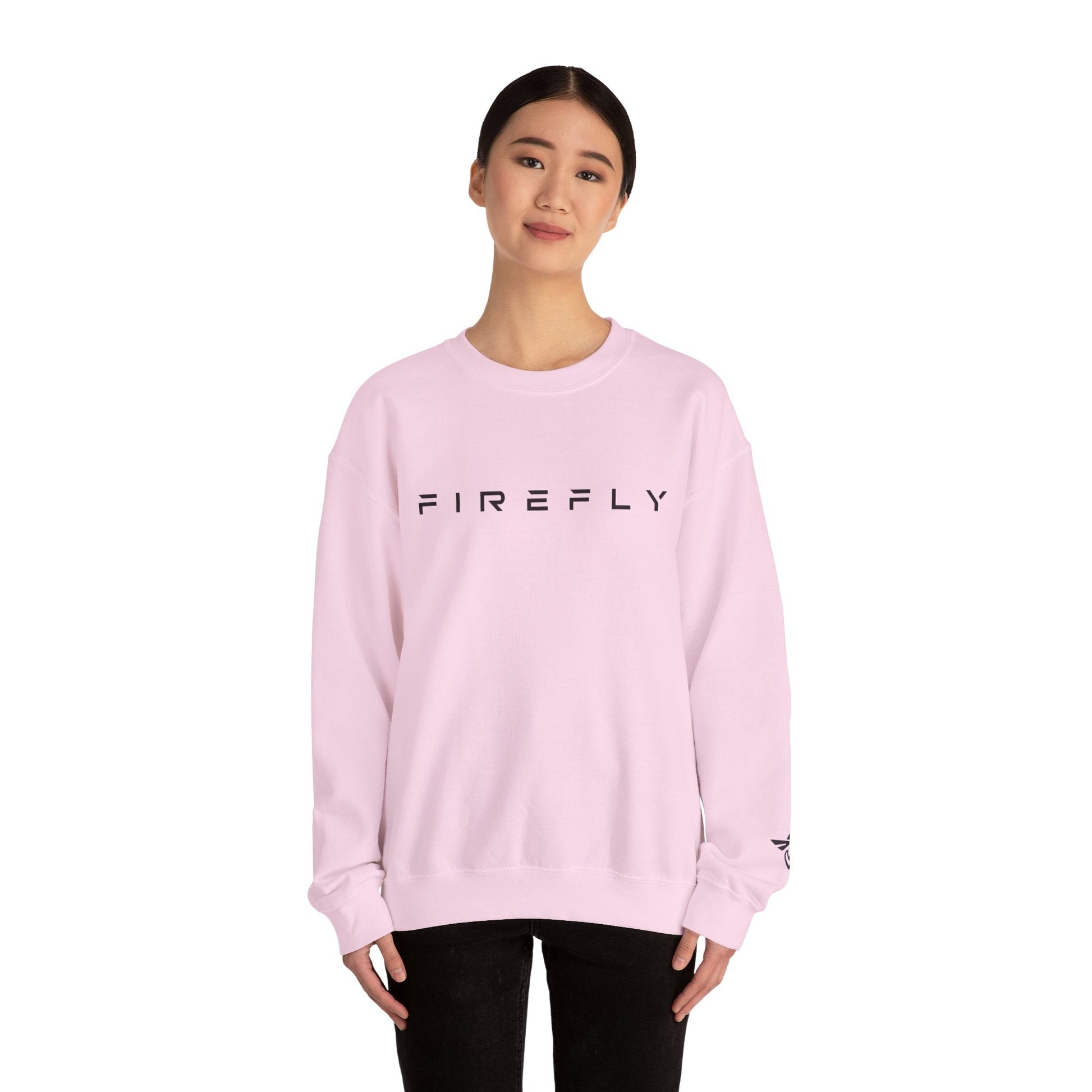 Person wearing a pink sweatshirt with 'Tastykake' logo on a white background