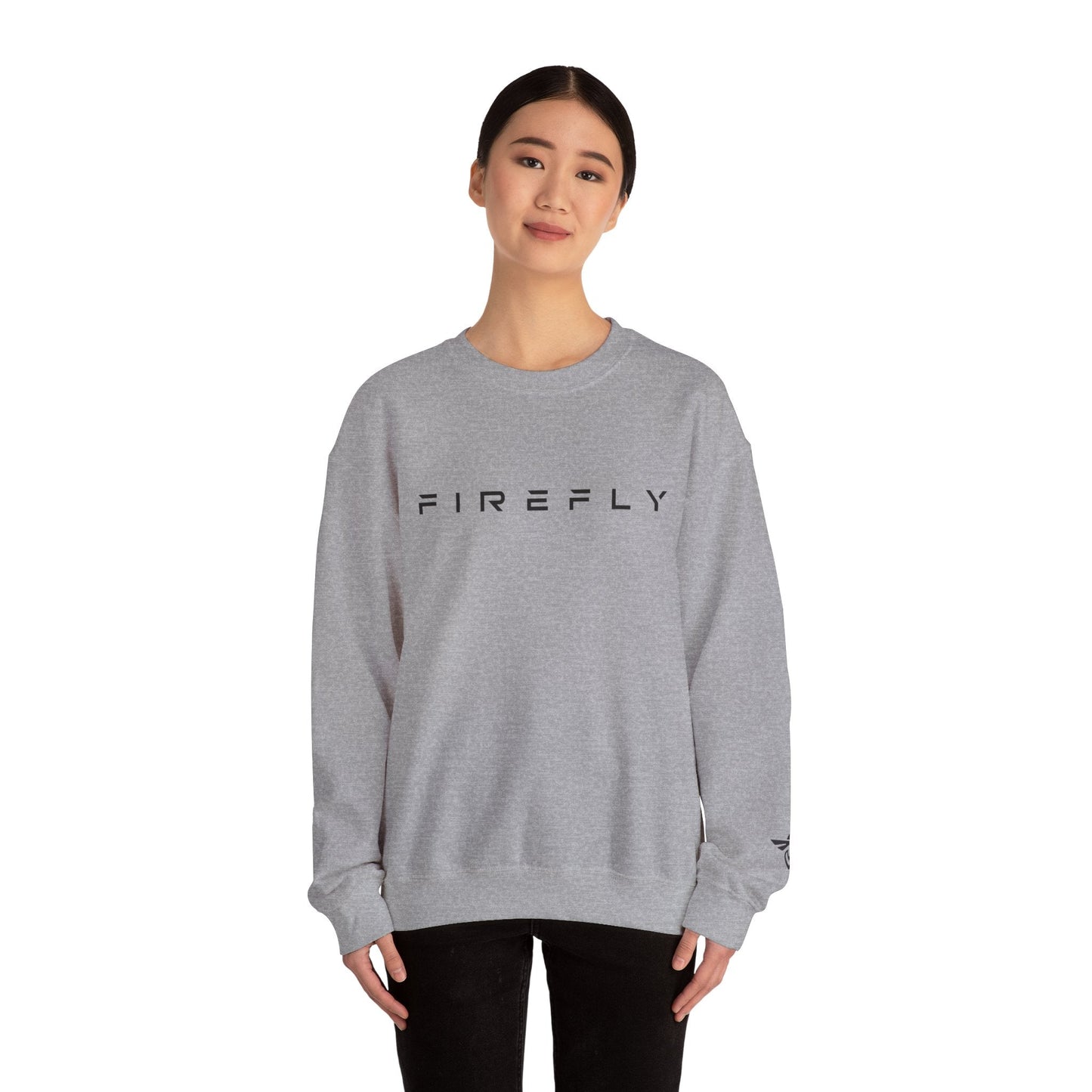 Person wearing a gray sweatshirt with 'Heir' and mountain design on a white background