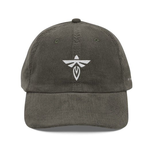 Olive cap with a white logo on a white background