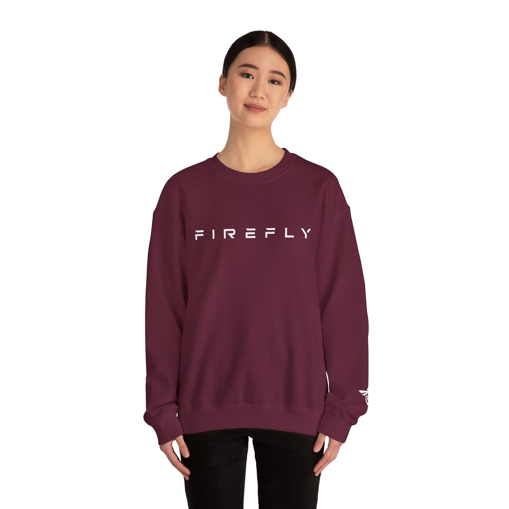 Person wearing a maroon sweatshirt with text on a white background