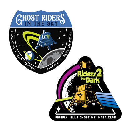 Two space-themed stickers with 'Ghost Riders in the Sky' and 'Riders 2 the Dark' designs on a white background.