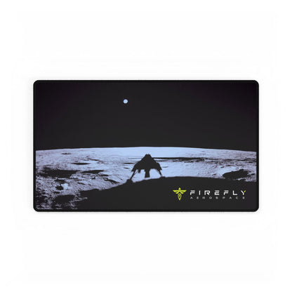 A rectangular gaming mouse pad with rounded corners featuring a black and white sci-fi landscape graphic of a rover and an astronaut under a dark sky, with the 'FIREFLY FIRESPACE' logo in the bottom right corner.