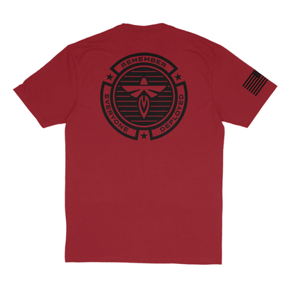 Red t-shirt with black graphic design on a white background