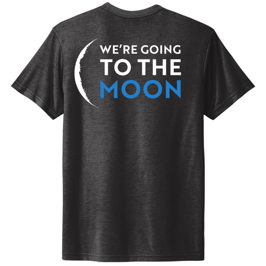 A gray t-shirt with the text 'WE'RE GOING TO THE MOON' printed on the back, featuring a crescent moon image above the text. Featuring Firefly Aerospace Blue Ghost Mission launch